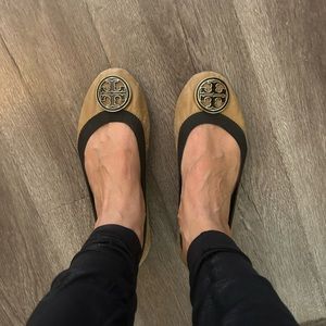 Tory Burch slip on flats.